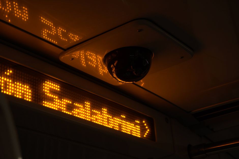 View of a security camera and electronic display inside a Buenos Aires train.