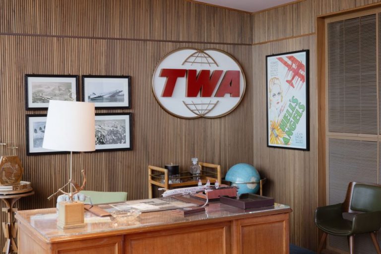 Retro TWA office design featuring vintage decor and aviation memorabilia at JFK Airport.