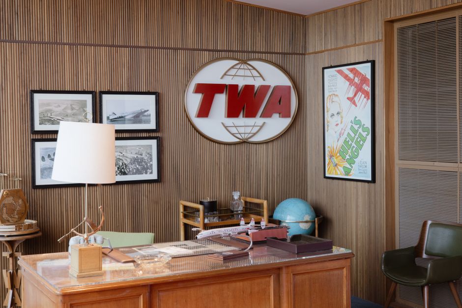 Retro TWA office design featuring vintage decor and aviation memorabilia at JFK Airport.