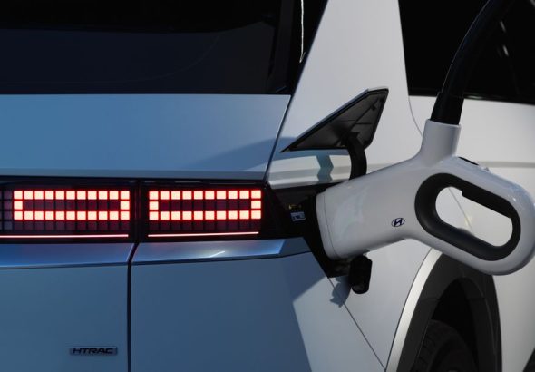 Close-up of a Hyundai Ioniq 5 charging, showcasing sustainability and innovation.