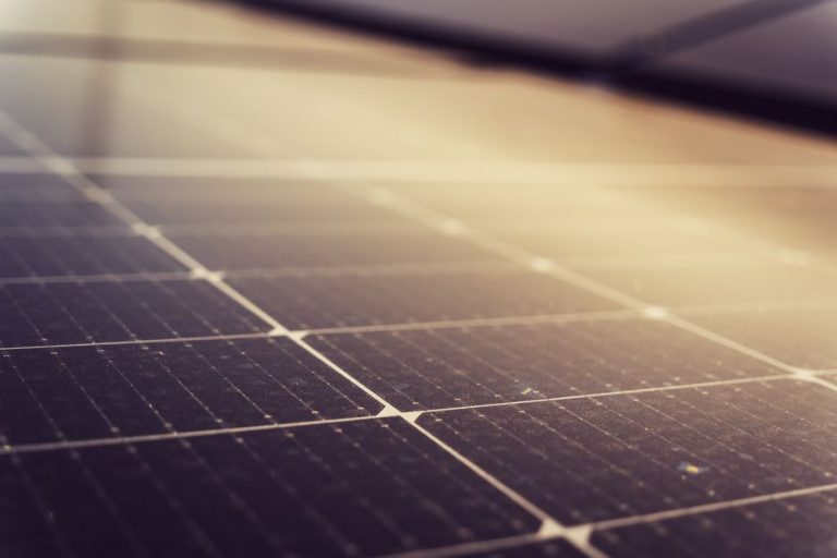 Detailed view of solar panels capturing sunlight, promoting renewable energy.