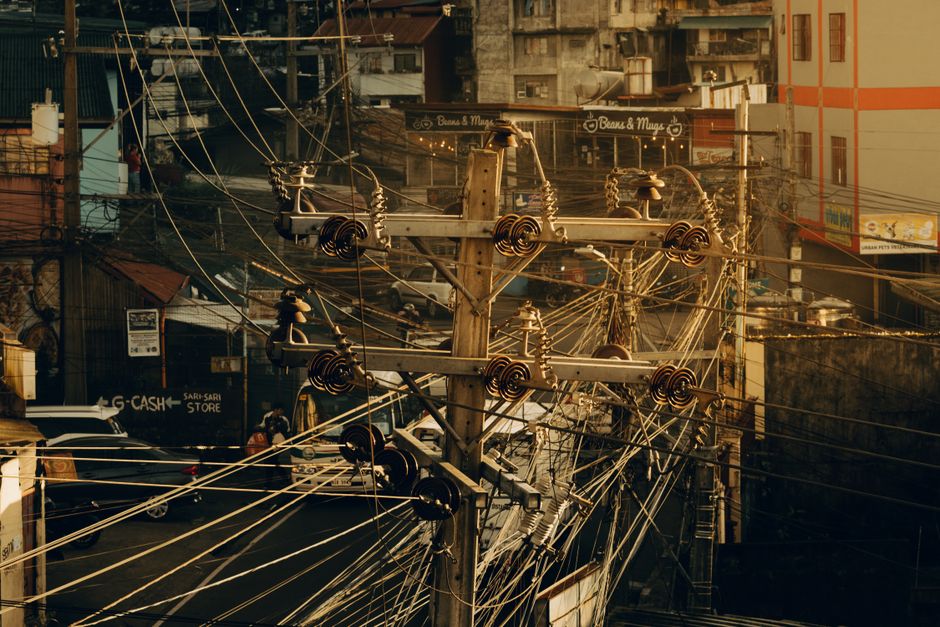 Tangled power lines in an urban setting revealing intricate connections.
