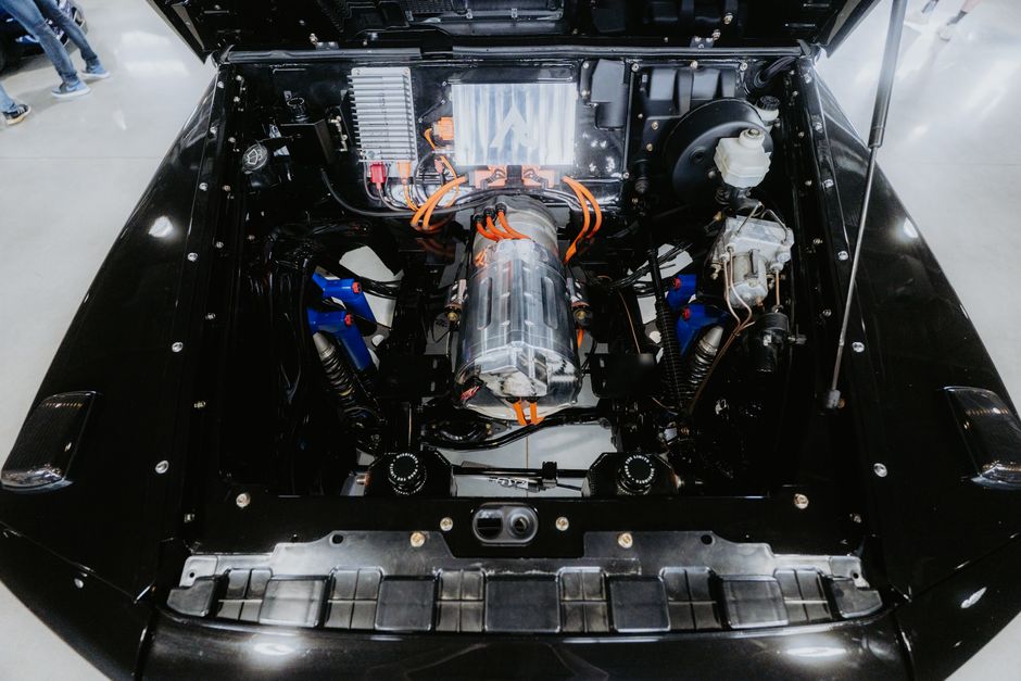Top view of a modern electric car engine showcasing technical components and design.