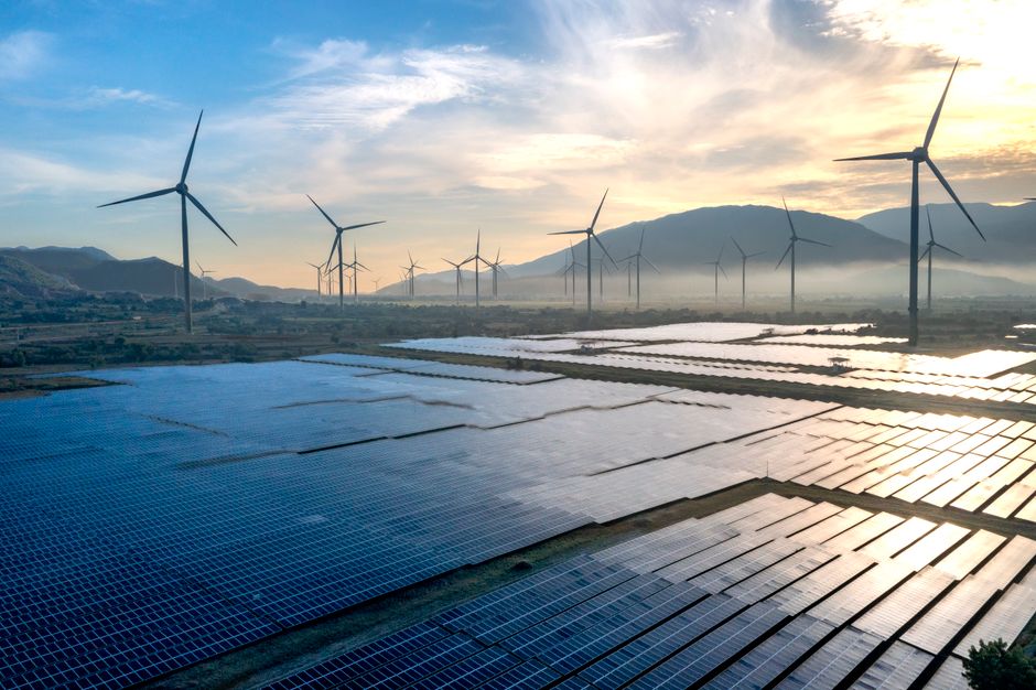 Scenic view of wind turbines and solar panels in Ninh Thuan, Vietnam, capturing sustainable energy efforts.
