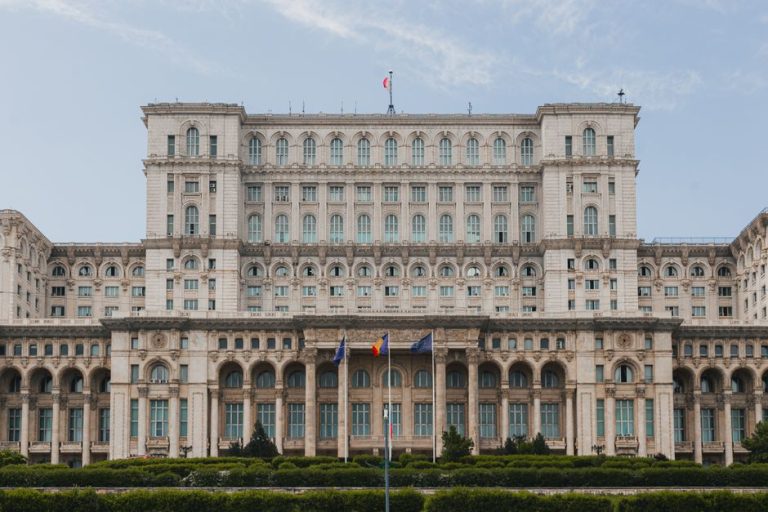 Front view of the grand Palace of the Parliament in Bucharest, Romania.