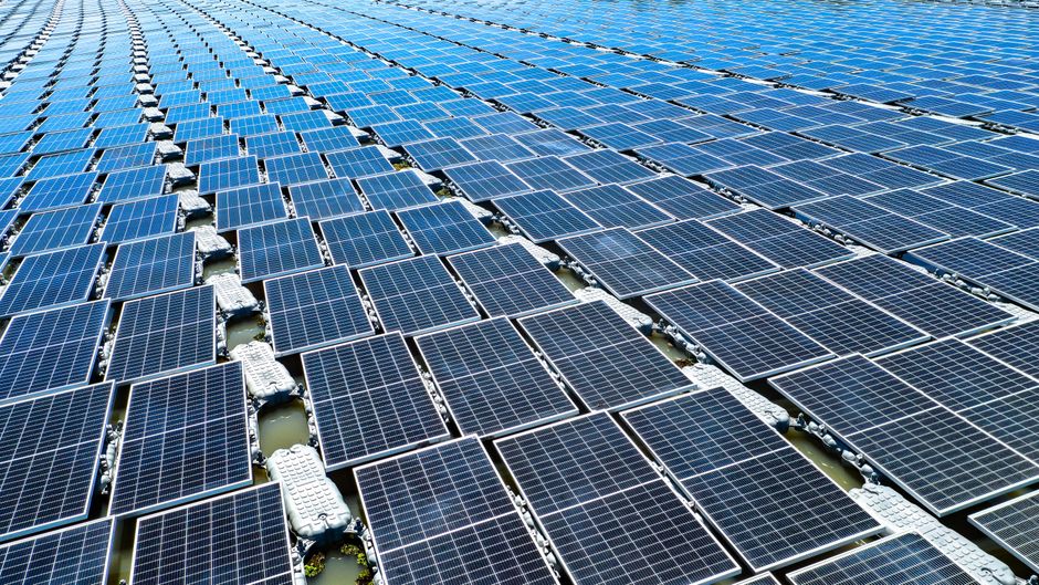 Aerial view of floating solar panels in Pasir Mas, Kelantan, illustrating renewable energy technology.