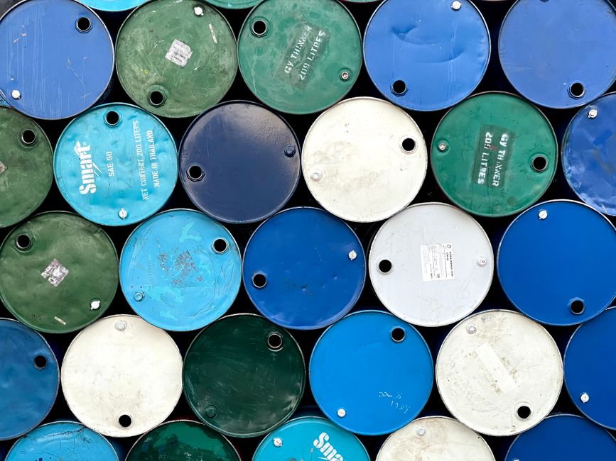 Aerial view of stacked colorful barrels in Myanmar, showcasing industrial design.