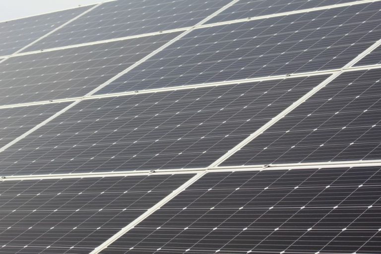 Detailed close-up of solar panels harnessing sunlight for sustainable energy generation.