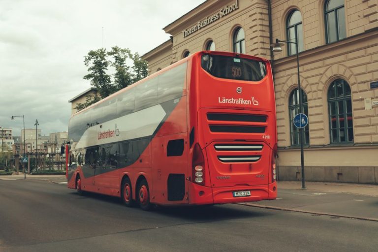 Red double decker bus on the streets of Jönköping near Thoren Business School in Sweden.