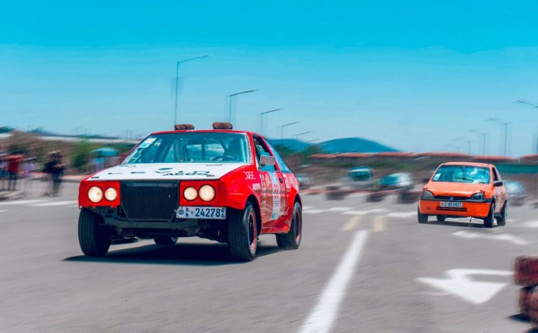 Dynamic car race in Ethiopia showcasing speed and action on the road.