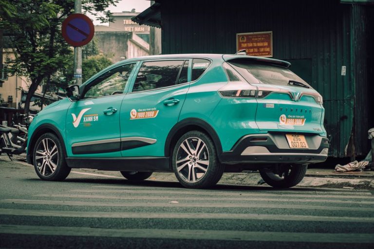 VinFast car parked on a city street in Vietnam with a focus on urban vehicle visuals.