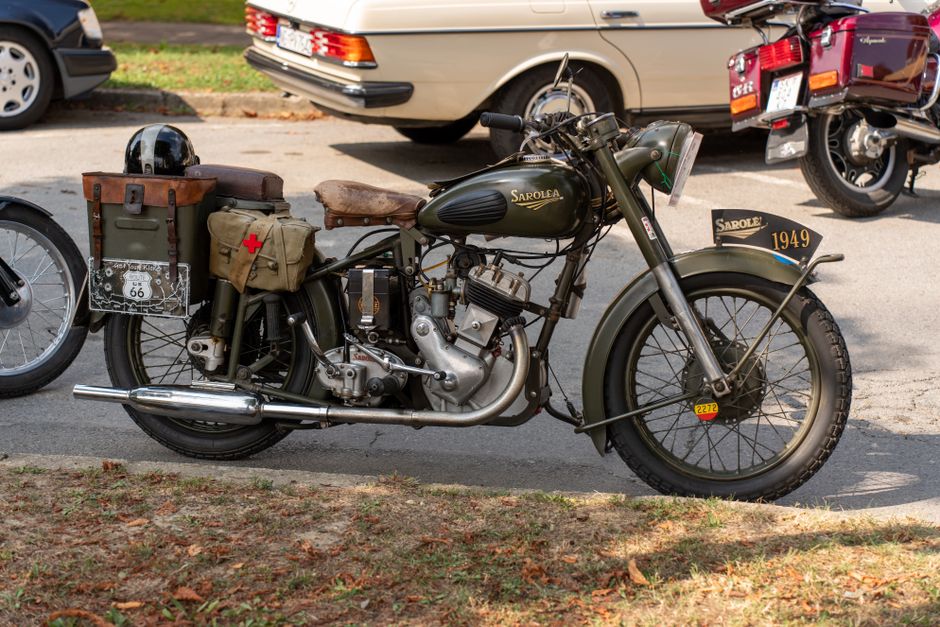 Classic 1949 Sarolea motorcycle parked on street, showcasing vintage design.