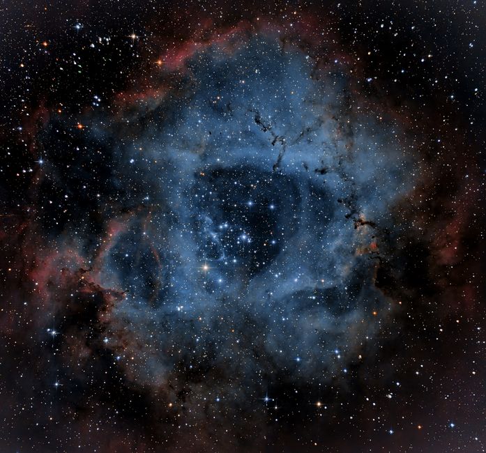 A mesmerizing view of the Rosette Nebula showcasing brilliant star clusters and cloud formations.