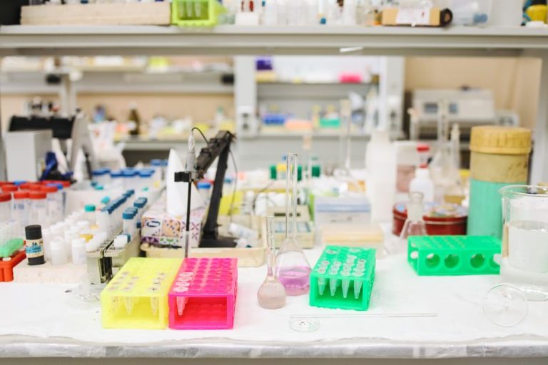 Bright and organized scientific laboratory with various equipment and test tubes.