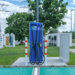 Public charging station with eco-friendly design for electric vehicles.