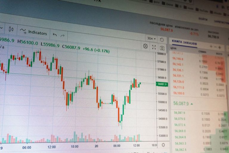 Close-up of digital cryptocurrency market graph showing price fluctuations and trading data.