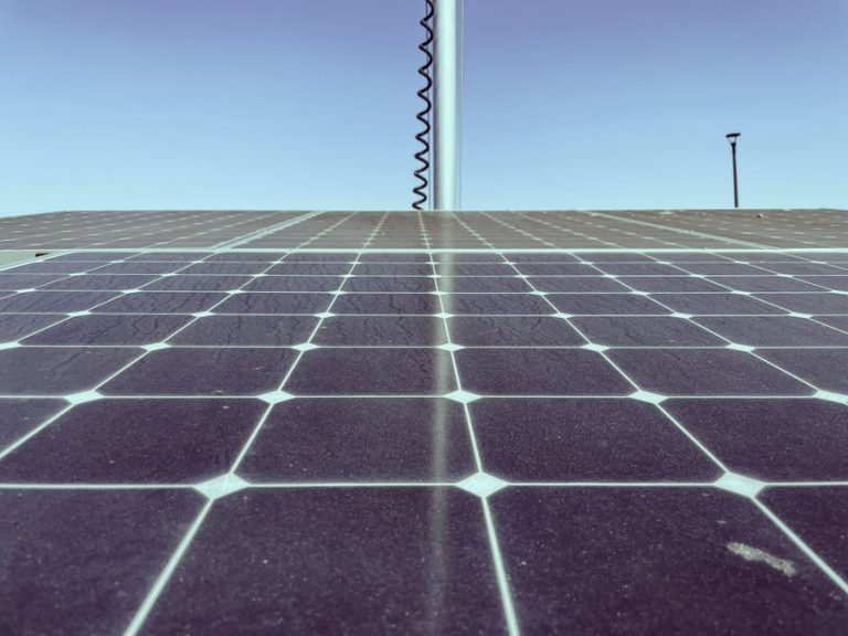 Detailed view of solar panels capturing sunlight, showcasing renewable energy technology.