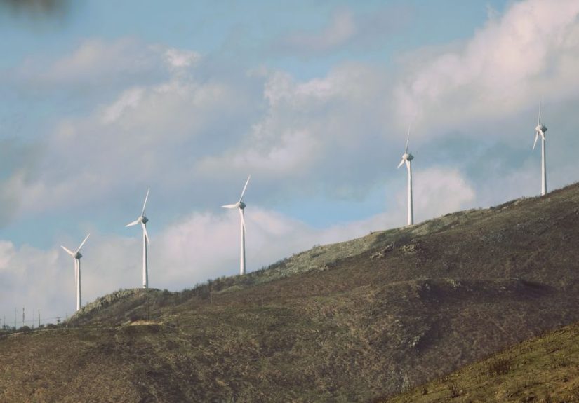 Scenic view of wind turbines generating renewable energy on a mountain in Dikella, Greece.