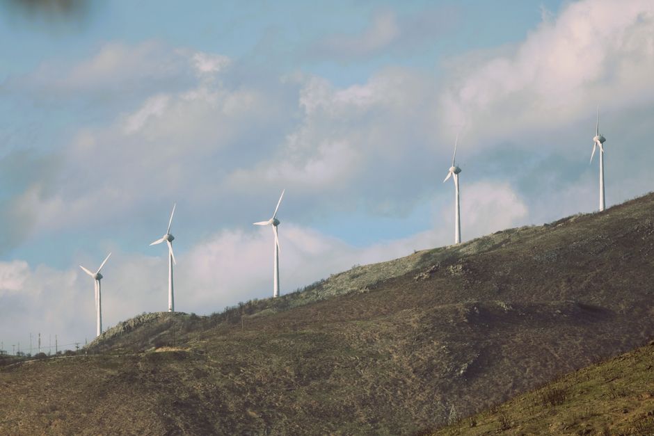Scenic view of wind turbines generating renewable energy on a mountain in Dikella, Greece.