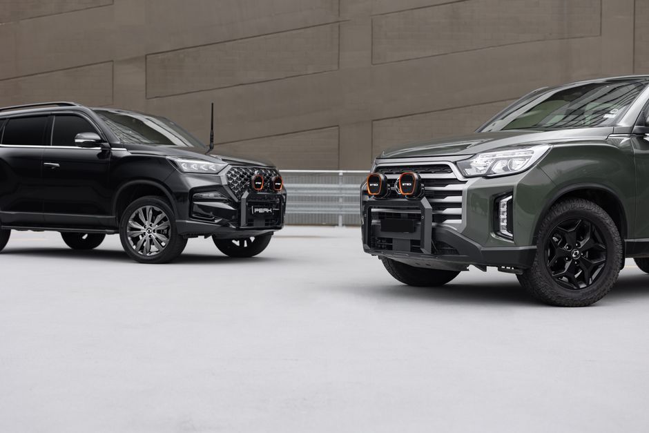 Capture of two modern SUVs showcasing stylish design and robust build in an urban environment.
