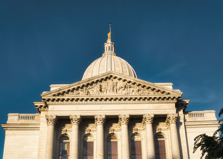 Stunning view of Wisconsin State Capitol building against a clear blue sky in Madison.