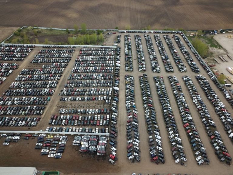 Aerial shot of a large vehicle storage or junkyard in Minnesota, USA.