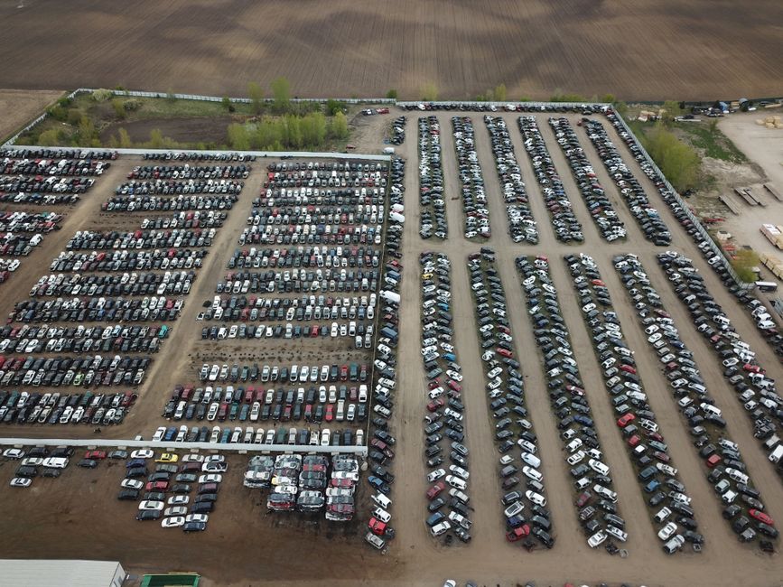 Aerial shot of a large vehicle storage or junkyard in Minnesota, USA.