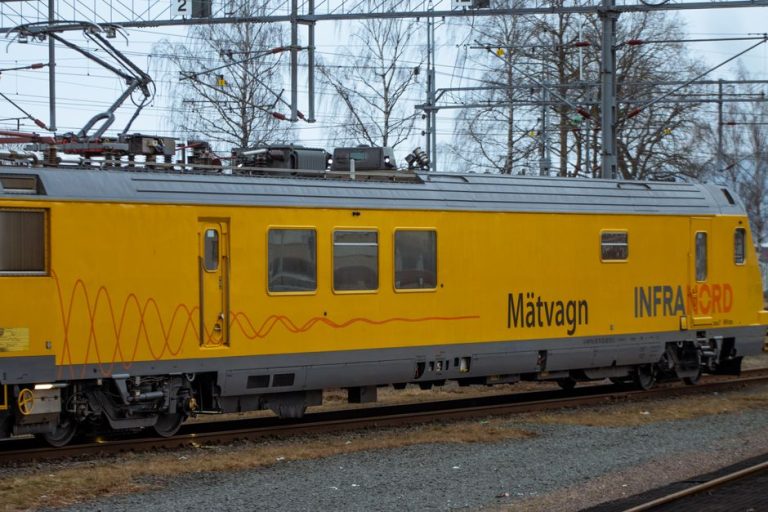 Infrastructure maintenance train on tracks in Jönköping, showcasing railway engineering.
