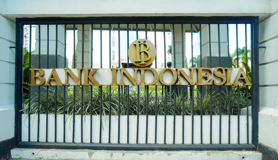 The entrance gate of Bank Indonesia in Bandung, showcasing the iconic logo and architecture.