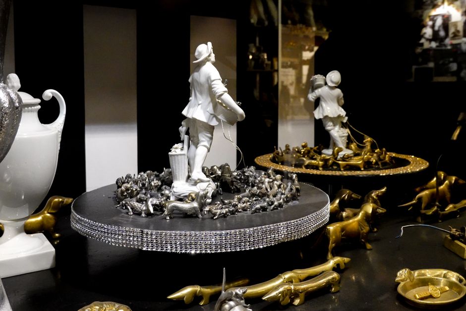 Intricate figurines displayed in a luxury art setting in Passau, Germany.