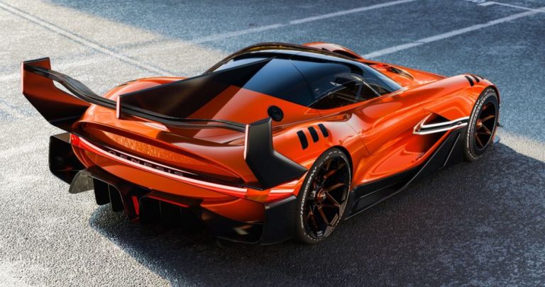 Stunning Genesis concept car showcasing sleek, futuristic design and luxury on an open road.