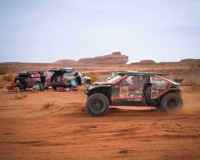Action-packed off-road rally race amidst stunning desert landscapes, capturing the thrill of adventure.