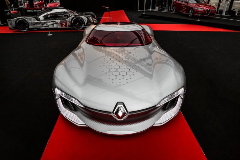 Sleek Renault concept car showcased at an automotive event, emphasizing modern design.